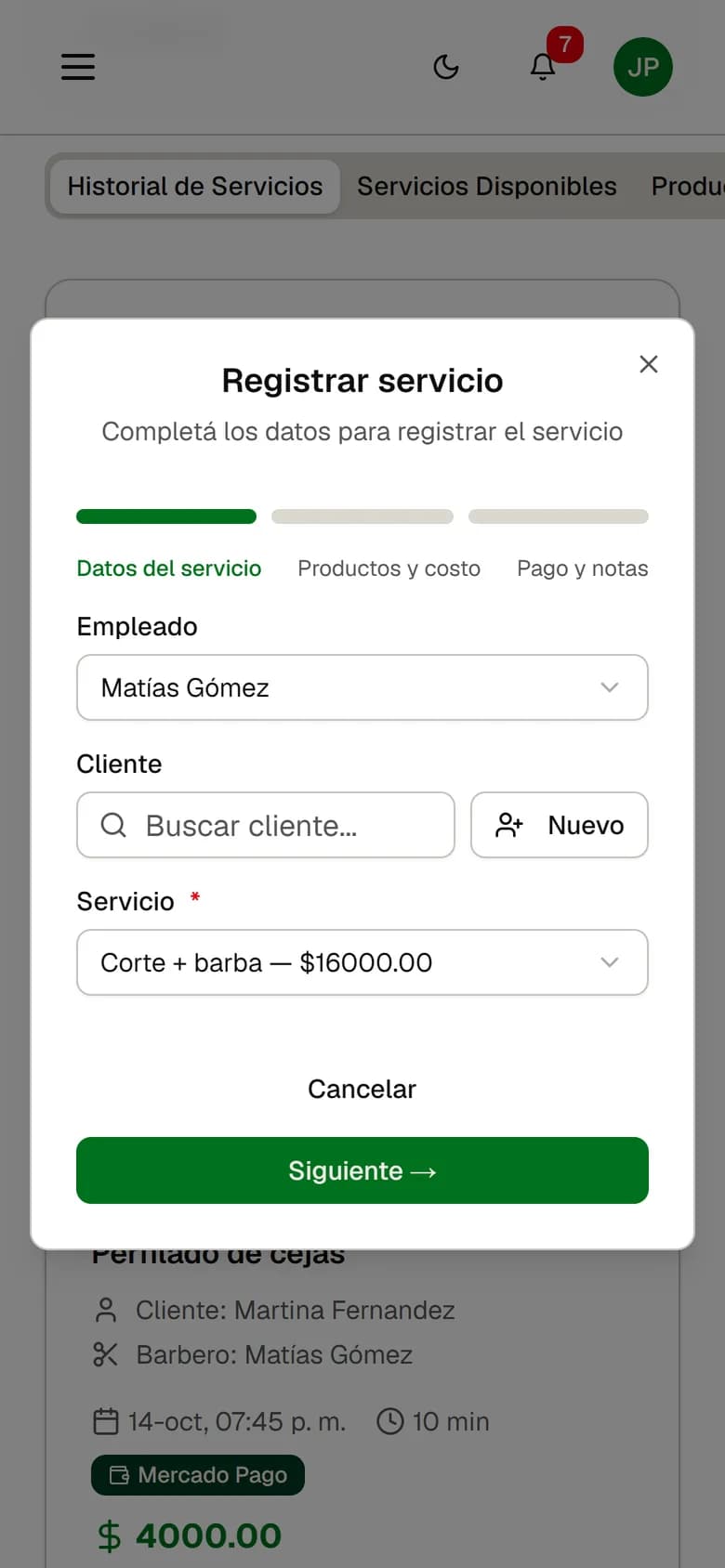 Pantalla de Registrar servicio en el celular: se elige barbero y servicio